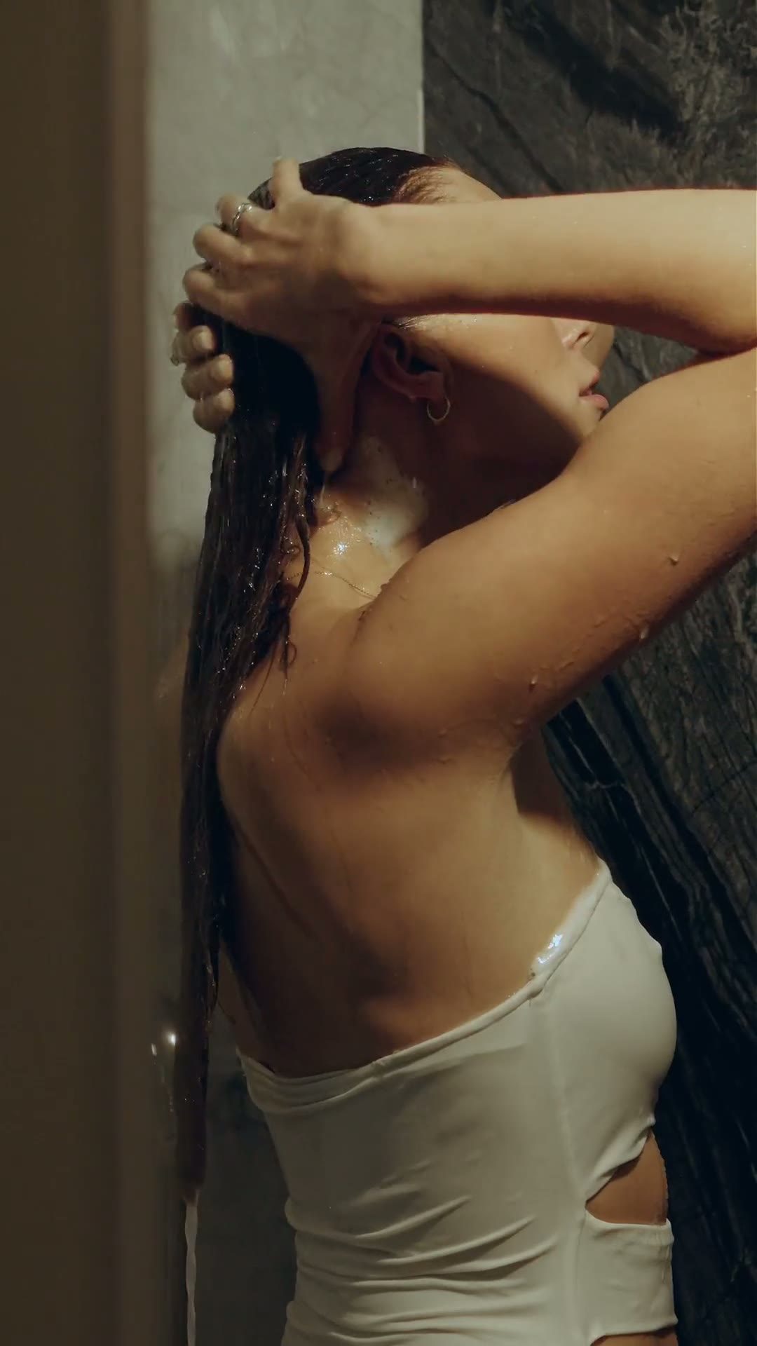 Vertical villa lifestyle film with a female model